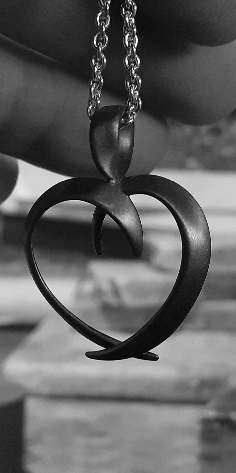 Open heart mobius pendant